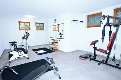 Das Fitnesscenter und/oder die Fitnesseinrichtungen in der Unterkunft Ferienresidenz Chiemseestrand - Apartment 24