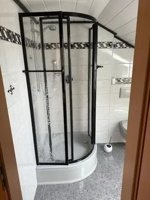 Ein Badezimmer in der Unterkunft Apartment Oase 2, Parkplatz, Küche, Internet