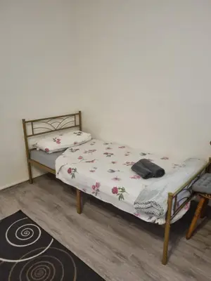 Ein Bett oder Betten in einem Zimmer der Unterkunft Gasthaus Weigl
