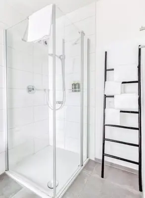 Ein Badezimmer in der Unterkunft My Suite - Augsburg City - Netflix