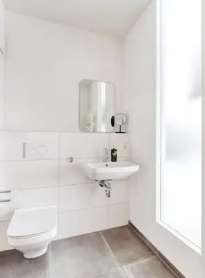 Ein Badezimmer in der Unterkunft My Suite - Augsburg City - Netflix