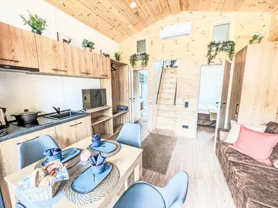 Küche/Küchenzeile in der Unterkunft Holiday Home Tiny Haus Glockenalm-Haus Puppenkiste by Interhome
