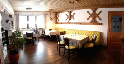 Ein Sitzbereich in der Unterkunft Gästehaus Bergfrieden, Ferienwohnung Susanne