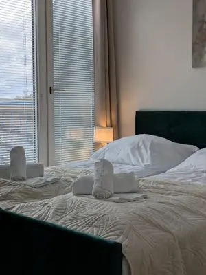 Ein Bett oder Betten in einem Zimmer der Unterkunft Munich Apartment 110 qm with 3 Bedrooms very cetral location 1 to 10 Guests