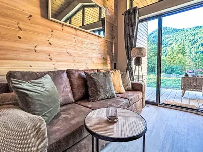 Ein Sitzbereich in der Unterkunft Holiday Home Tiny Haus Glockenalm-Haus 4-Jahreszeiten by Interhome