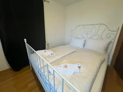 Ein Bett oder Betten in einem Zimmer der Unterkunft ღLIBORIA I Als Gruppe in Uffing I 4 min zum See I Sauna