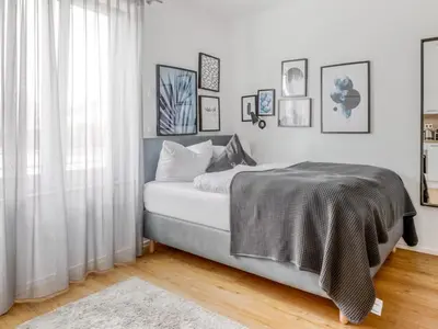 Ein Bett oder Betten in einem Zimmer der Unterkunft My Suite II - Augsburg City - Netflix
