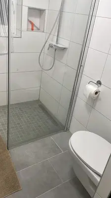 Ein Badezimmer in der Unterkunft TopLageEG