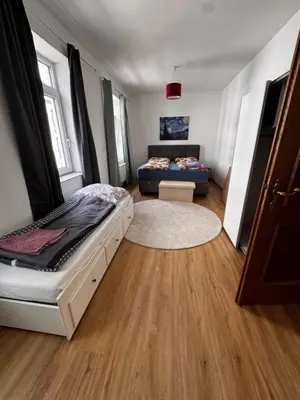 Ein Bett oder Betten in einem Zimmer der Unterkunft Bade Homes Deluxe