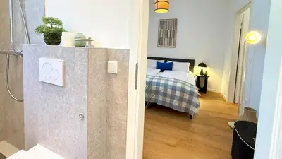 Ein Bett oder Betten in einem Zimmer der Unterkunft BeckHomes Munich - Stylish Central Apartments