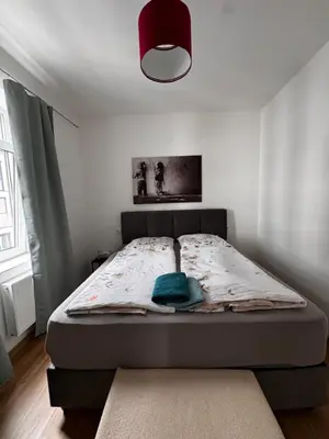Ein Bett oder Betten in einem Zimmer der Unterkunft Aby Deluxe Wohnung