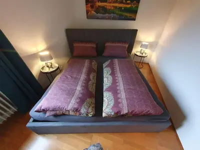 Ein Bett oder Betten in einem Zimmer der Unterkunft Ammergau feeling de Luxe