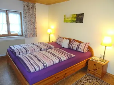 Ein Bett oder Betten in einem Zimmer der Unterkunft Apartment Schwalbe by Interhome