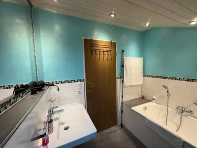Ein Badezimmer in der Unterkunft Zugspitze 7 mit SAUNA in Farchant bei Garmisch-Partenkirchen