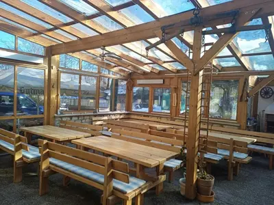 Ein Restaurant oder anderes Speiselokal in der Unterkunft Apartment Nord-Amerika DG