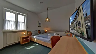 Ein Bett oder Betten in einem Zimmer der Unterkunft Pension Dorfstraße 6