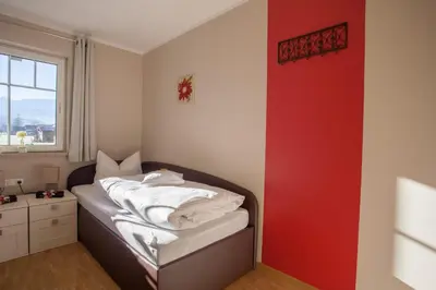 Ein Bett oder Betten in einem Zimmer der Unterkunft Hochgefühl
