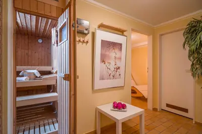 Ein Bett oder Betten in einem Zimmer der Unterkunft Bergschlössl - Appartment 25 mit Traumblick über das Inntal