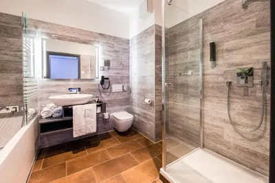 Ein Badezimmer in der Unterkunft premium by GS Hotel
