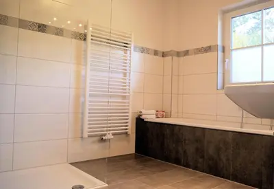 Ein Badezimmer in der Unterkunft Heidi's Ferienwohnung2