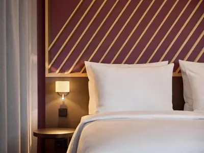Ein Bett oder Betten in einem Zimmer der Unterkunft B&B Hotel München City-Nord