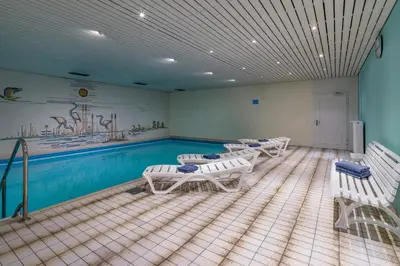 Der Swimmingpool an oder in der Nähe von Ferienwohnanlage Oberaudorf C4 mit Hallenbad und Sauna
