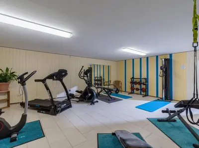 Das Fitnesscenter und/oder die Fitnesseinrichtungen in der Unterkunft Ferienwohnanlage Oberaudorf C 2 mit Hallenbad und Sauna