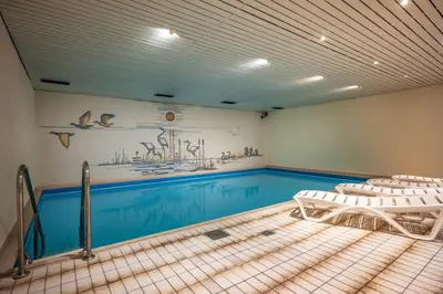 Der Swimmingpool an oder in der Nähe von Ferienwohnanlage Oberaudorf D 2 mit Hallenbad und Sauna