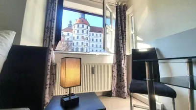 Ein Bett oder Betten in einem Zimmer der Unterkunft Neuburg Apartment am Schloss