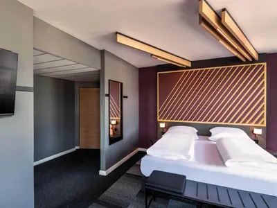 Ein Bett oder Betten in einem Zimmer der Unterkunft B&B Hotel München-Hbf