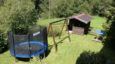 Ein Kinderspielbereich in der Unterkunft Ferienwohnung Nr 1, Lechbruck-Gründl, Allgäu