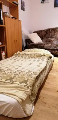 Ein Bett oder Betten in einem Zimmer der Unterkunft Cosy Room