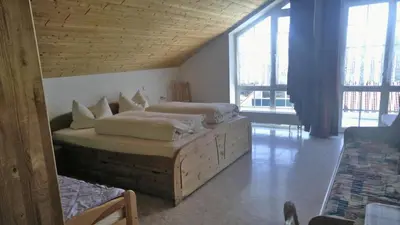 Ein Bett oder Betten in einem Zimmer der Unterkunft Gästehaus am Rathaus, Doppelzimmer 1